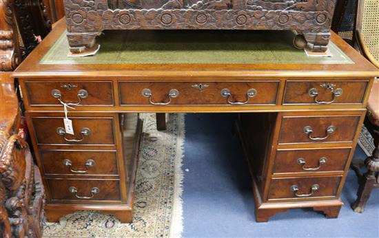 A George III style walnut and burr walnut pedestal desk W.137cm